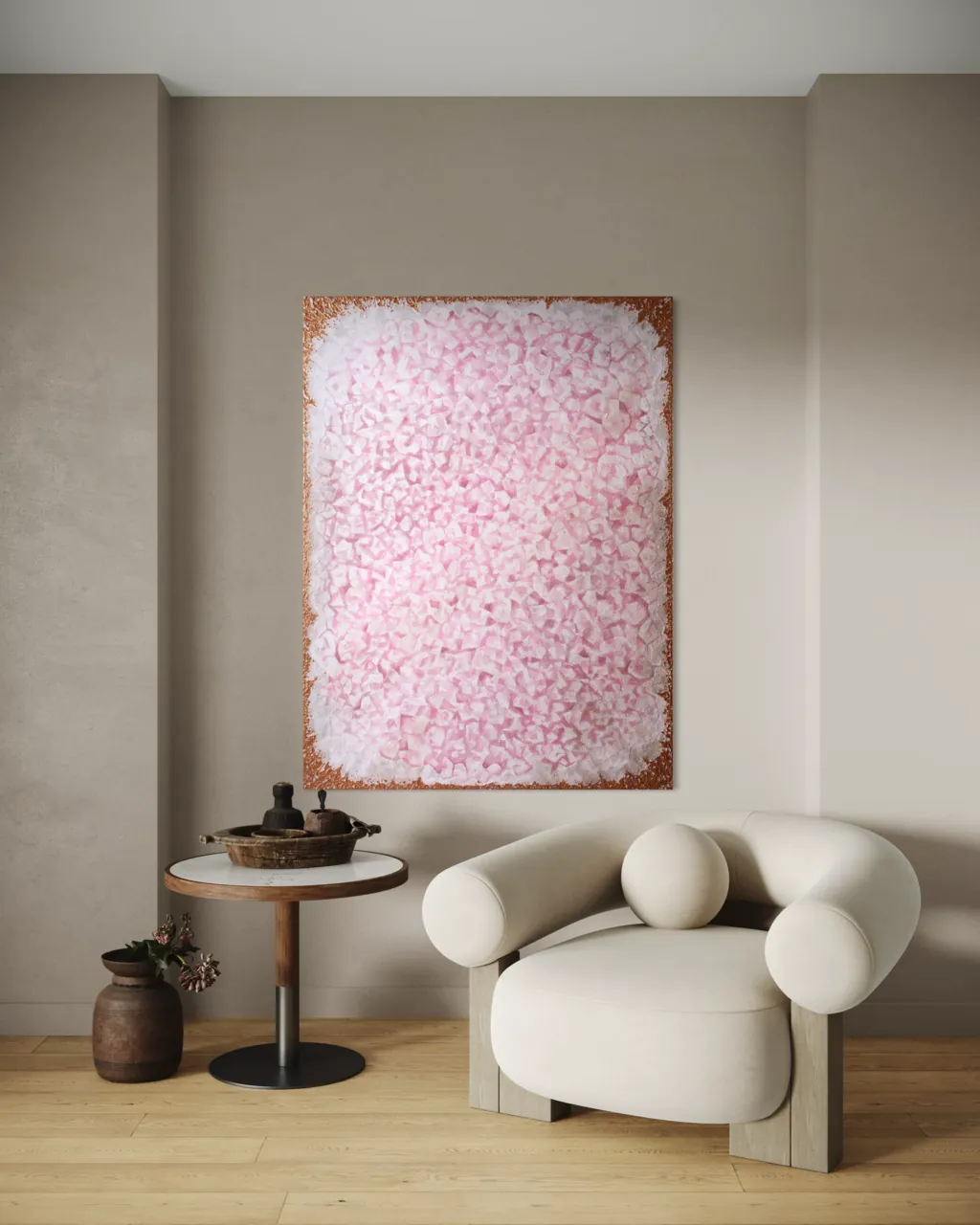 Rose Quartz painting in a bright room beside a cream bouclé armchair